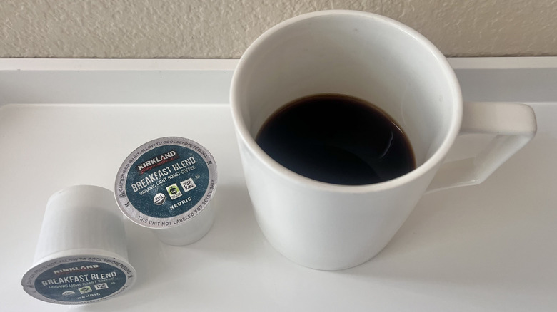 Breakfast Blend coffee pod with a mug