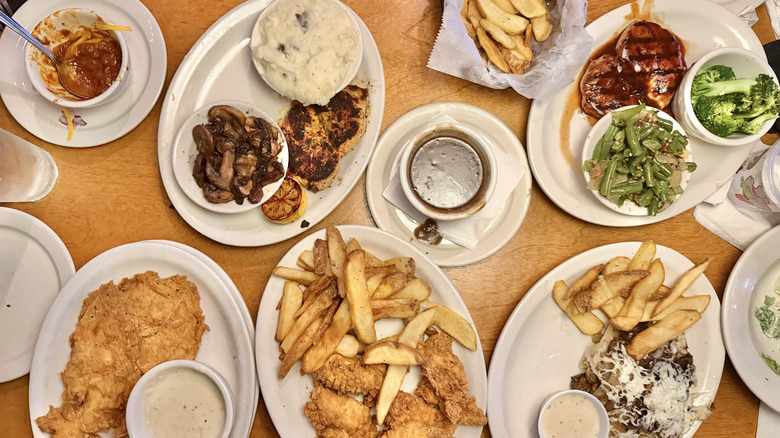 Top view of Texas Roadhouse chicken dinners on a table