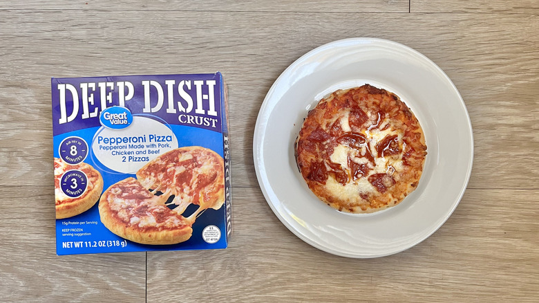Top view of Great Value Deep Dish Pepperoni Pizza on wooden background