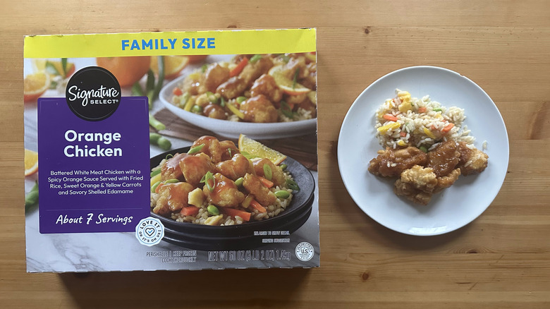 Signature Select Orange Chicken on plate on wooden table