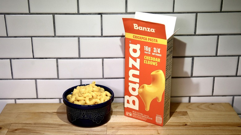 Banza box and bowl of mac and cheese next to it