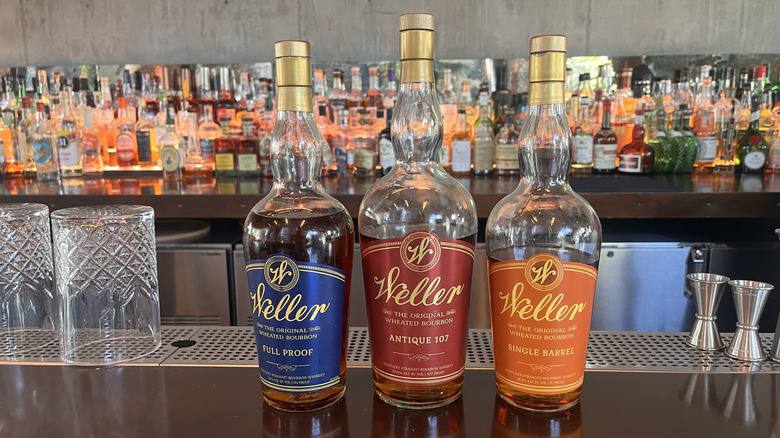 Three Weller bottles on a bar counter