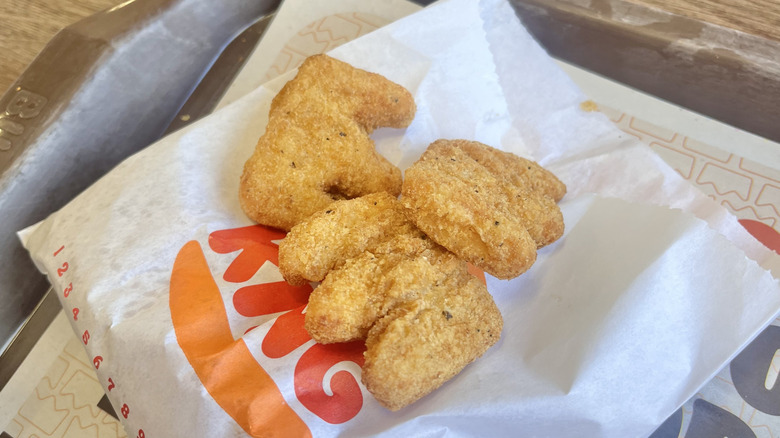 Three Crown Nuggets on a paper wrapper