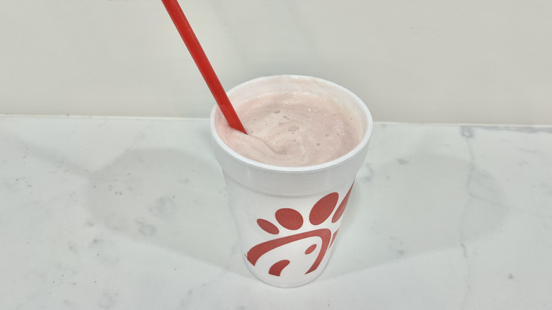 Chick-fil-A Pineapple Dragonfruit Frosted Lemonade with straw.