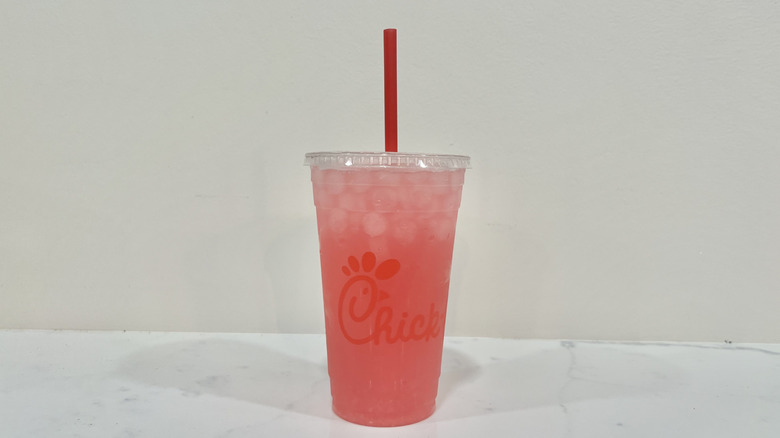 Chick-fil-A Pineapple Dragonfruit Lemonade with straw.