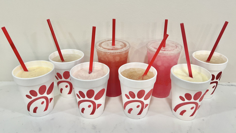8 different Chick-fil-A lemonades in to-go cups.