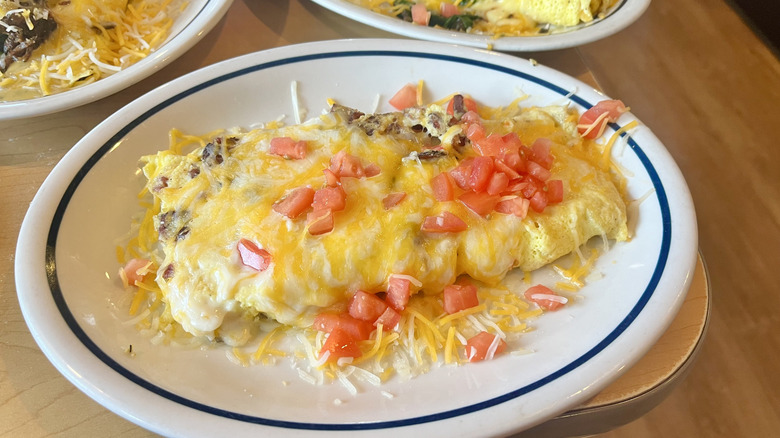 Bacon Temptation Omelette with tomatoes