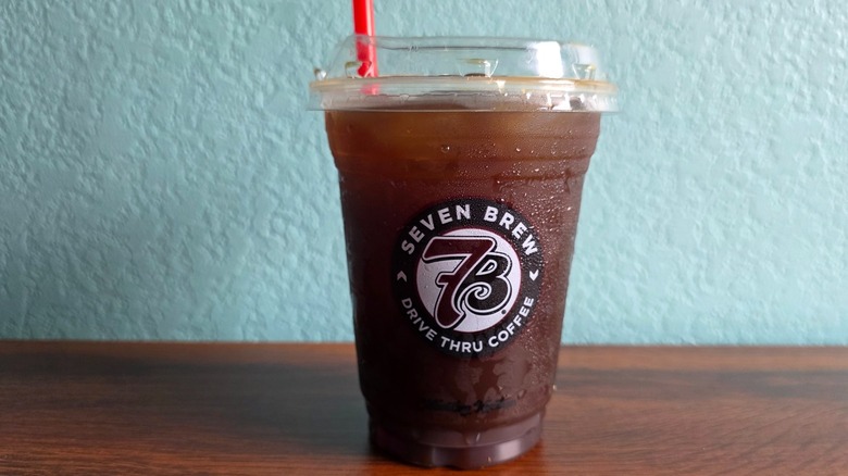 Cup with White Mac cold brew on table