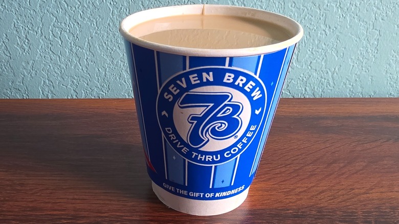 Cup containing a blondie on a table