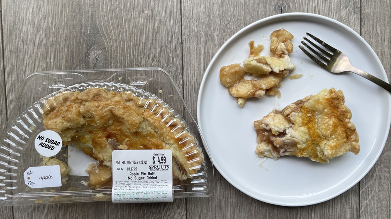 Sprouts pie in container and with slice pulled out on a plate