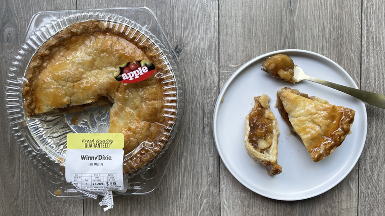 Winn-Dixie apple pie in container and with slices pulled out on a plate