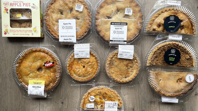 Assorted Apple Pies on wooden background