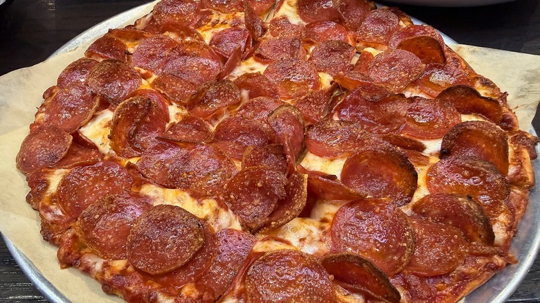 Close-up of Donatos pizza on tray