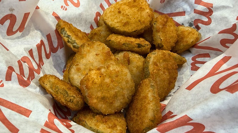Close-up of basket of crispy fried pickles at Red Robin
