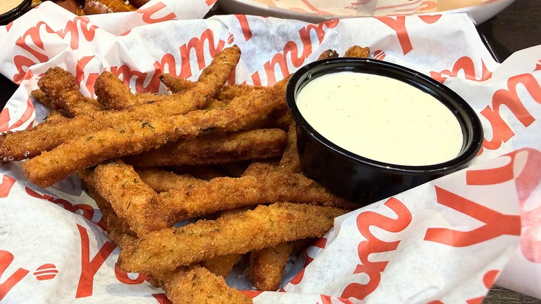 Close-up of basket of zucchini fries and ranch in Red Robin basket