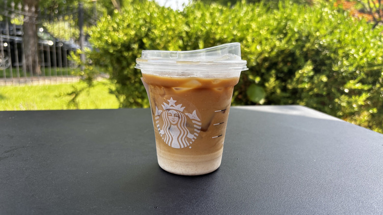 Starbucks iced shaken espresso drink on table