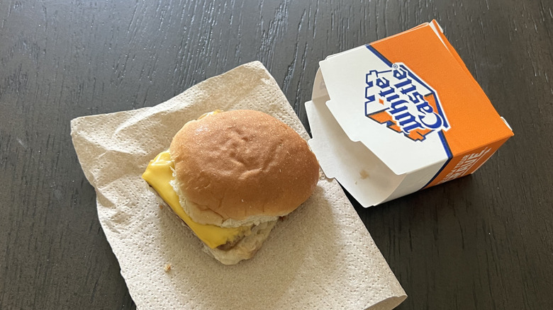 White Castle cheese slider with a box on a napkin