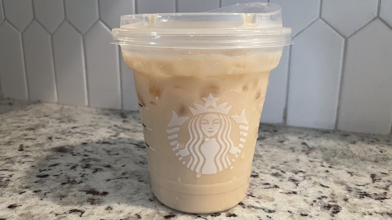 Starbucks Iced latte on a granite countertop.