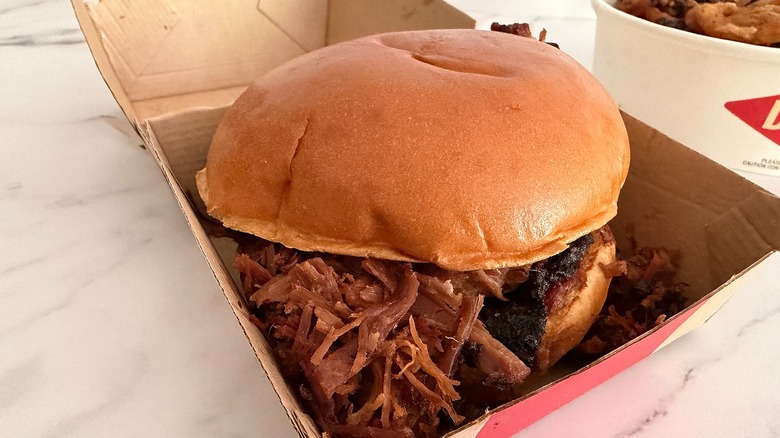 Close-up of Arby's brisket sandwich in sandwich box