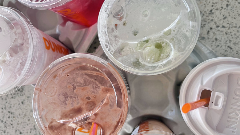 Top view of Dunkin drinks on a countertop