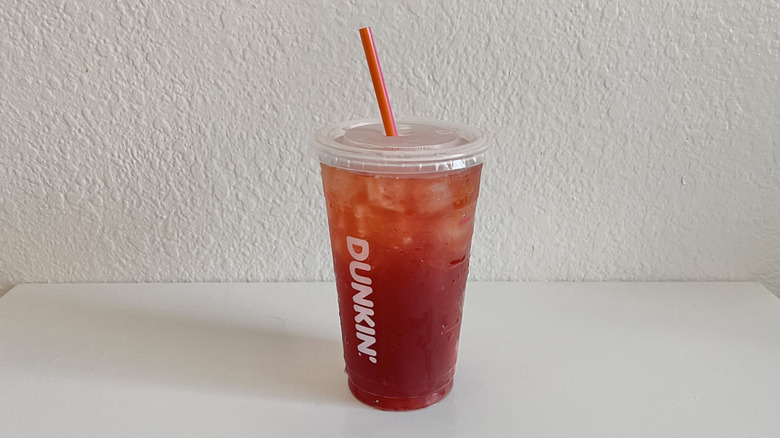 Dunkin' Zero  Peachberry Tea on a table