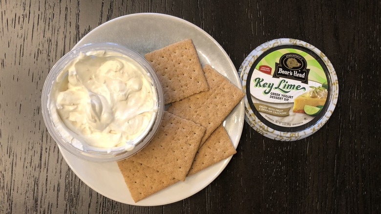 Boar's Head key lime Greek yogurt dip on plate with graham crackers.