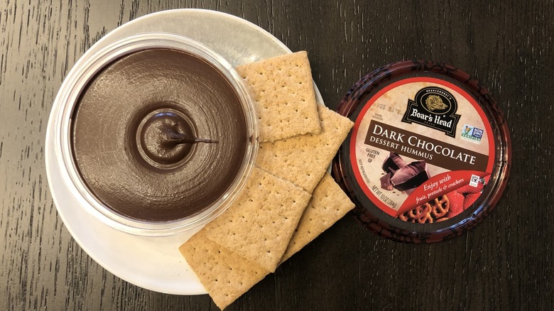 Boar's Head dark chocolate dessert hummus on plate with graham crackers.
