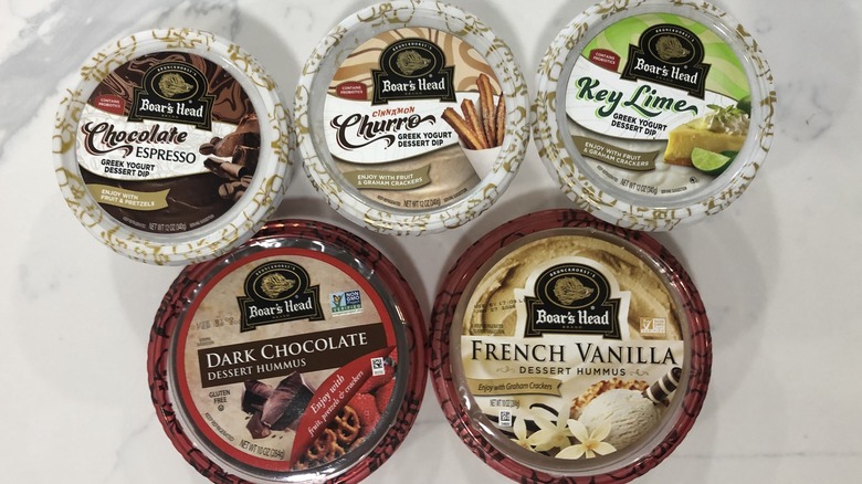 5 different Boar's Head dessert dips laid out on counter.