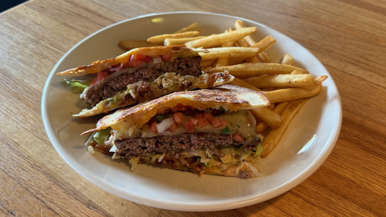Applebee's Quesadilla Burger and fries on plate.