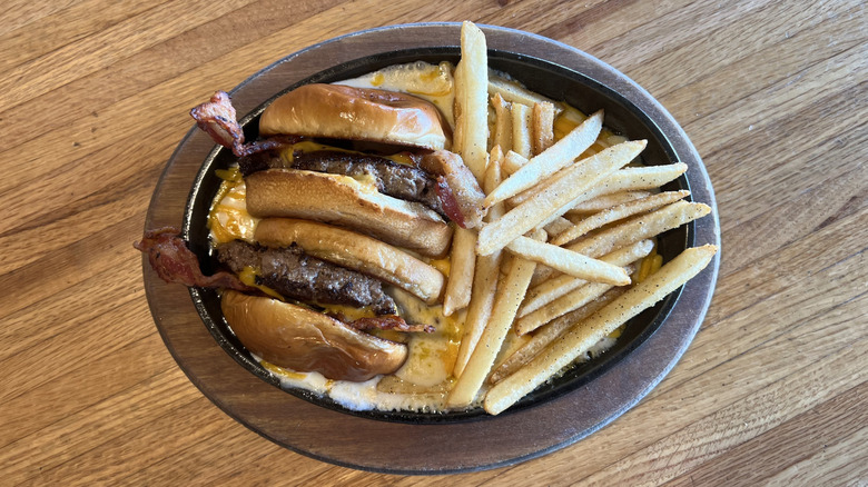 Applebee's O-M-Cheeseburger and fries on plate.