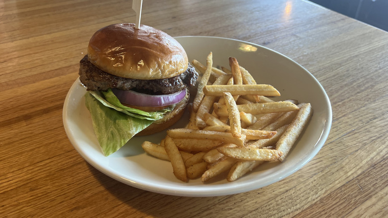 Applebee's Classic Burger and fries on plate.