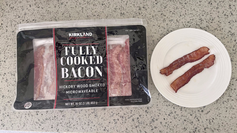 Fully-Cooked Hickory Wood Smoked Bacon slices on a plate