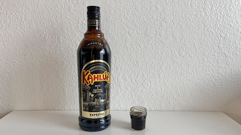 Especial Kahlúa bottle and small glass on a table