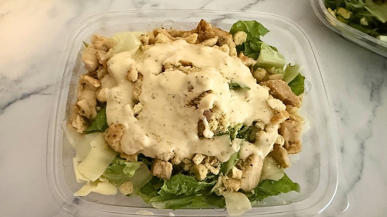 Wendy's Parmesan Caesar Salad in box on marble surface