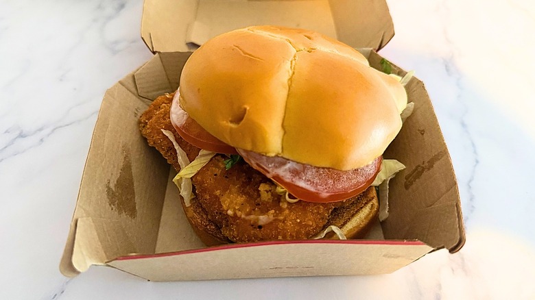 Wendy's Spicy Chicken Sandwich in box on marble surface