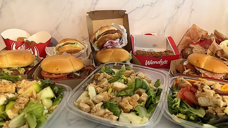 Several chicken items from Wendy's on marble surface