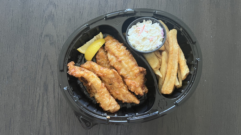 Red Robin House-Battered Fish & Chips meal in to-go box with fish fillets, lemon slices, coleslaw, and fries