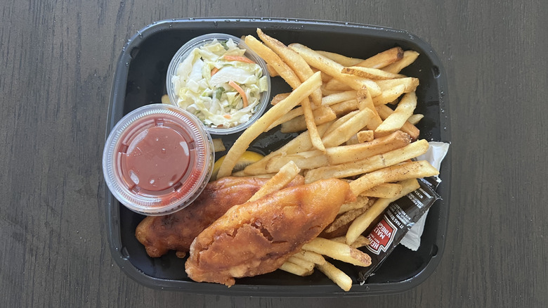 Top view of Applebee's hand-battered fish and chips meal in to-go box