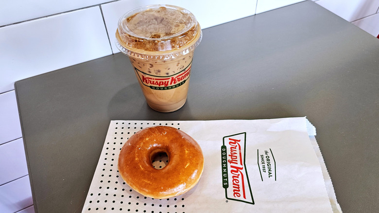 Glazed Krispy Kreme donut and iced coffee