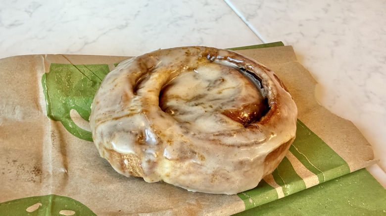Panera Pumpkin Cinnamon Roll on a paper bag
