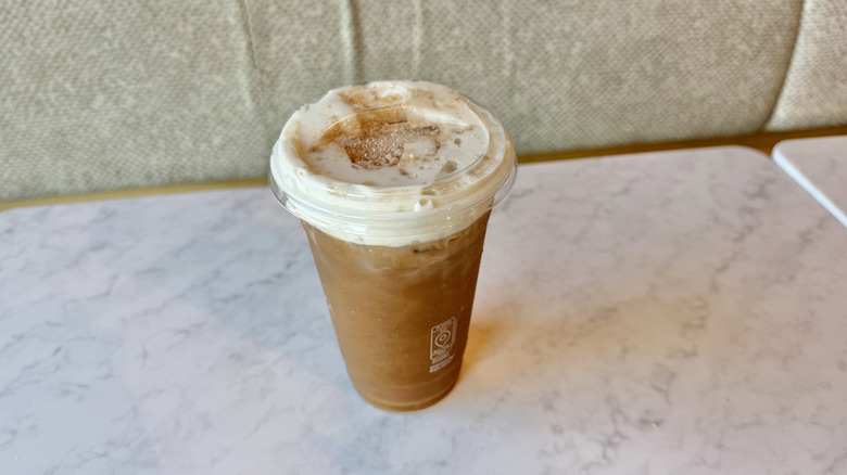 Panera Pumpkin Spice Iced Coffee on a table