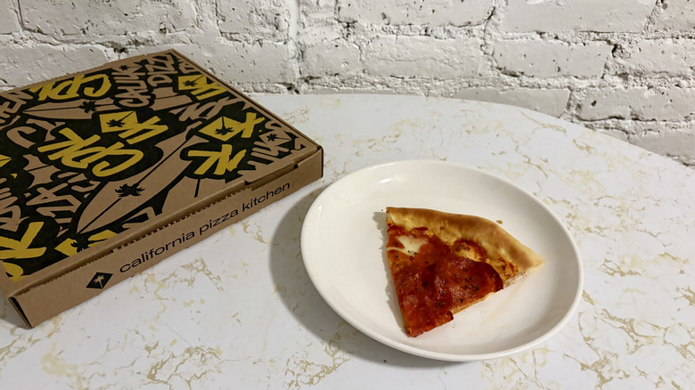 California Pizza Kitchen box and slice of pepperoni