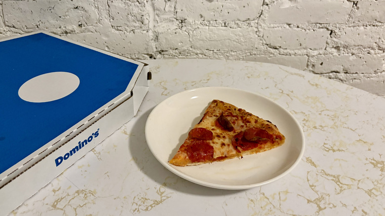 Domino's box and slice of pepperoni