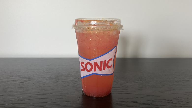 Sonic Strawberry Passion Fruit Sparkling Refresher in to-go cup.