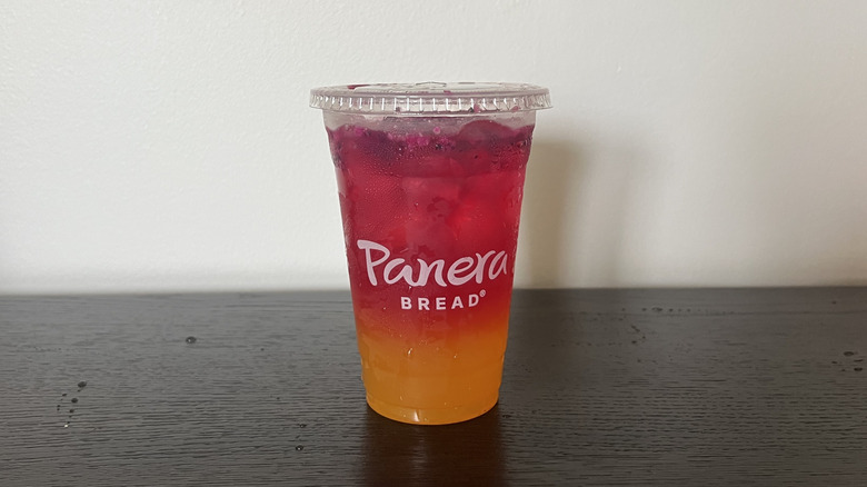 Panera Bread Dragonfruit Sunset Energy Refresher in to-go cup.