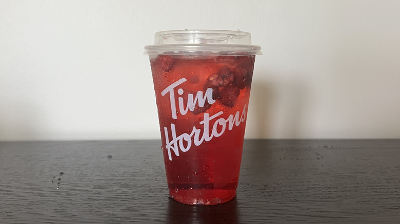Tim Hortons Raspberry Pomegranate Refresher in to-go cup.
