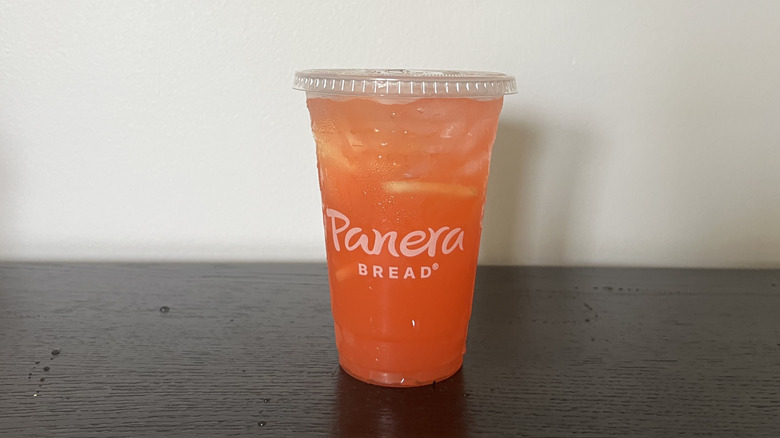 Panera Bread Passionfruit Paradise Energy Refresher in a to-go cup.