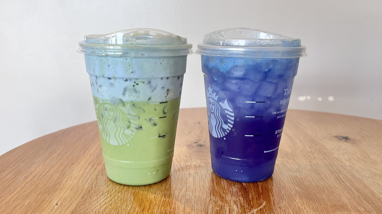 Two Starbucks drinks on a table