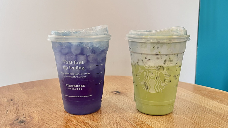 Two drinks on a table at Starbucks