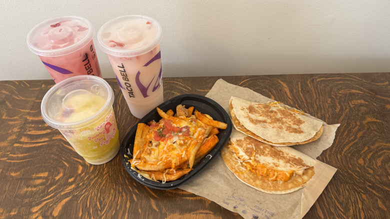 New Taco Bell items including three beverages, loaded nacho fries, and two Crunchadillas